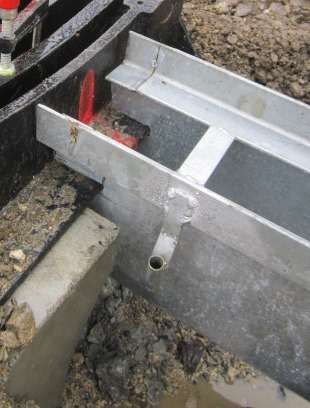 Insert Channel into cesspit and secure with clamps.